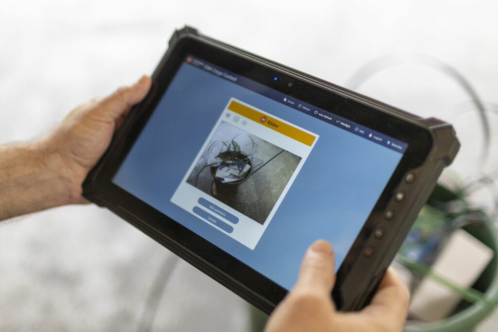 Person views delivery on tablet